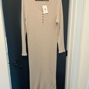 Chic Beige Ribbed Knit Long Sleeve Dress
Fits more like XL